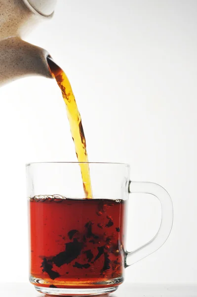Filiżanka herbaty i czajniczek — Zdjęcie stockowe