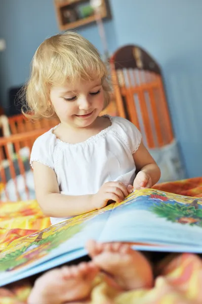 Little girl with book — Stock Photo, Image