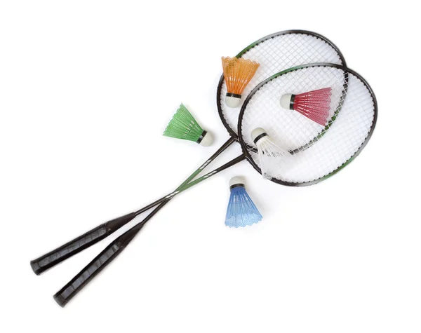 Raquetes de badminton com shuttlecocks de cor — Fotografia de Stock