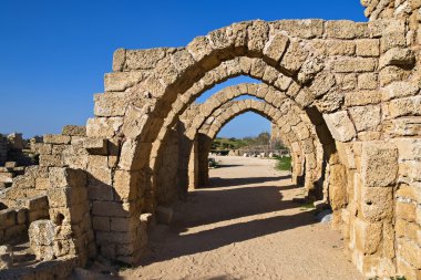 Roman Harbor Ruins In Caesarea clipart