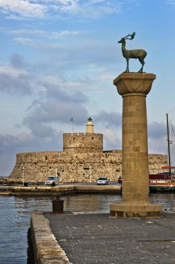 Lighthouse And Deer Statue, Rhodes clipart