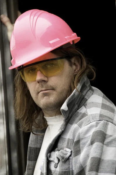 粉红色安全帽的男人 — 图库照片#
