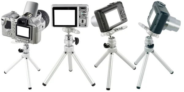 Câmeras compactas no conjunto de tripé — Fotografia de Stock