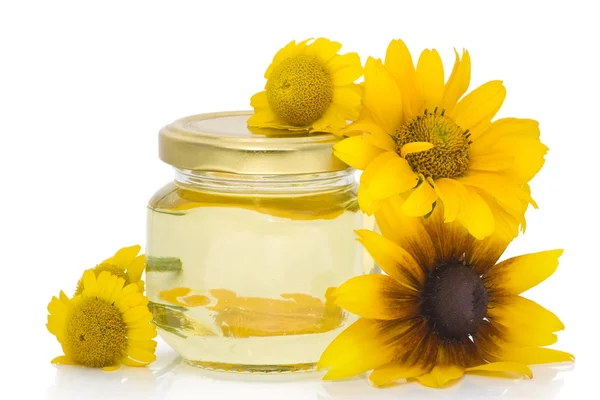 Cosmetic oil from yellow flowers — Stock Photo, Image