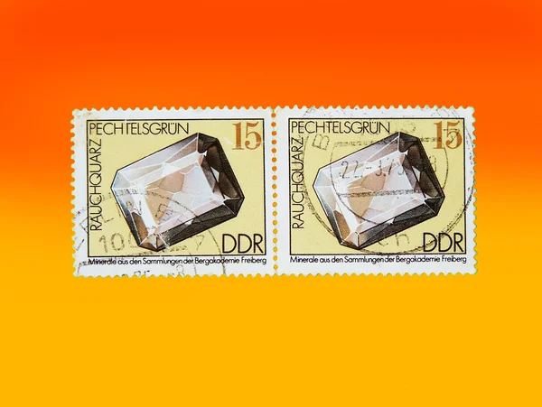 Double stamp on an orange background — Stock Photo, Image