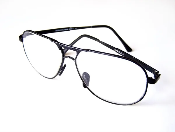 Óculos de leitura em um fundo branco — Fotografia de Stock