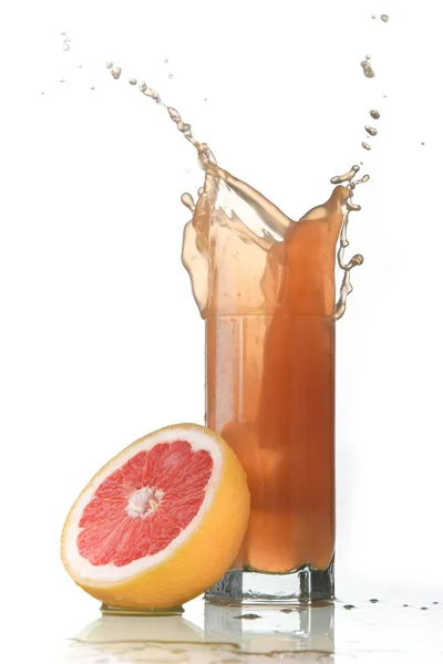 Pink grapefruit juice splash — Stock Photo, Image