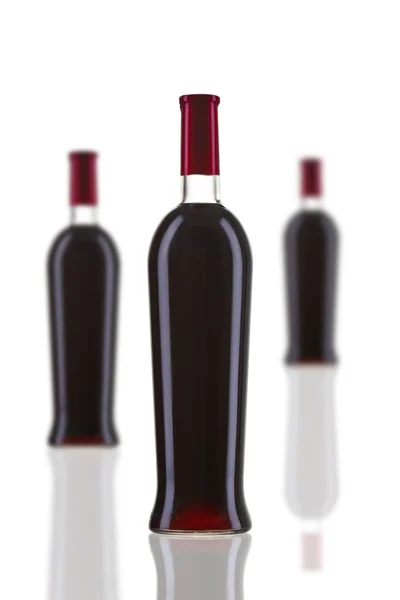 Flasker med rødvin - Stock-foto