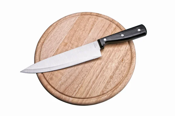 Ніж і дерев'яна тарілка для кухні — стокове фото
