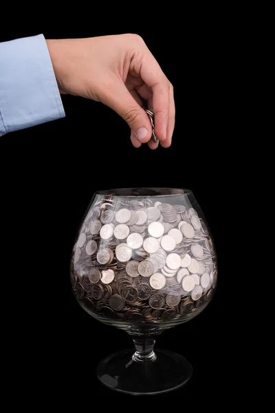 Put money into glass — Stock Photo, Image