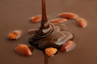 Liquid chocolate with nuts clipart