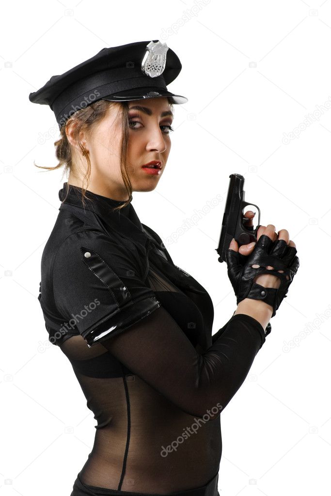 Beautiful policewoman with a gun
