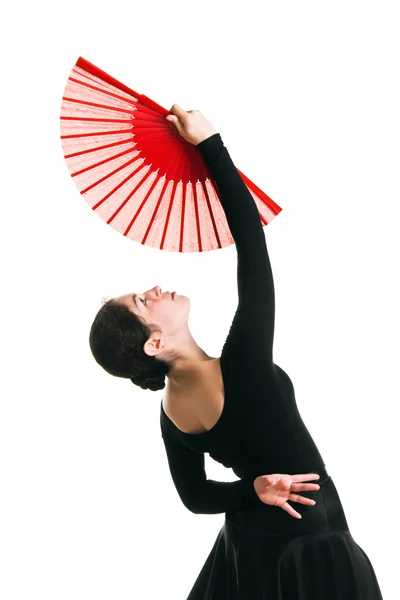 Beautiful dancer girl with a red fan — Stock Photo, Image