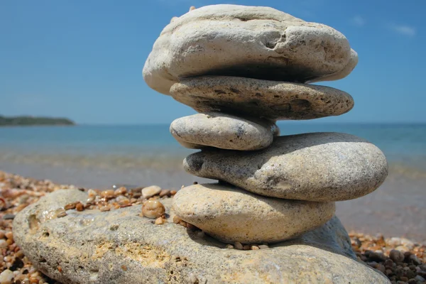 stock image Balanced stones on beach