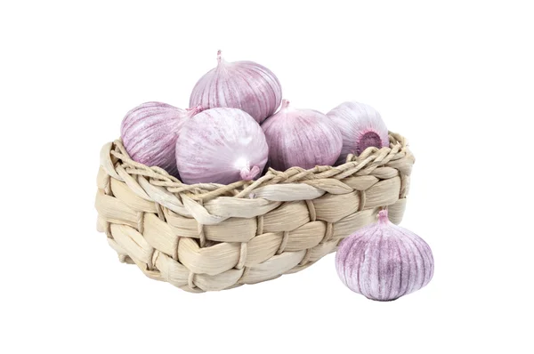 Several garlic in a wicker basket — Stock Photo, Image