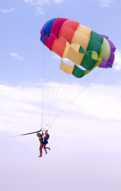 Parachute in tow with two clipart