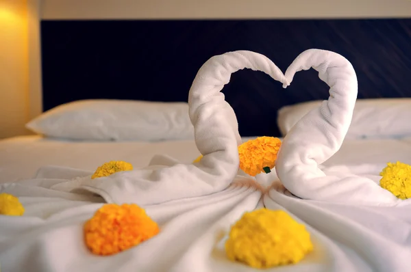 stock image Bed Suite decorated with flowers and towels.