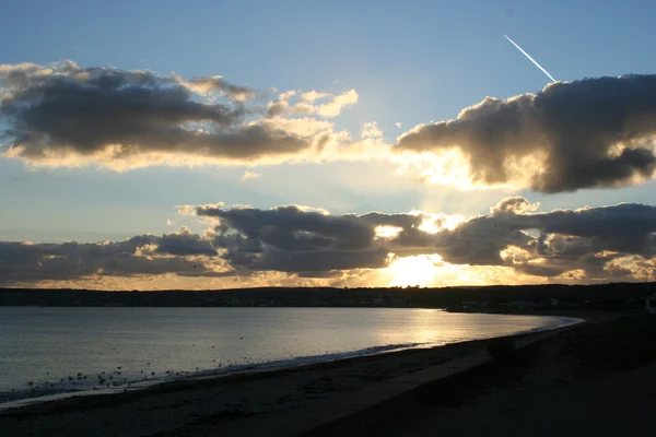 Pôr do sol sobre St Michael 's Bay, Reino Unido — Fotografia de Stock