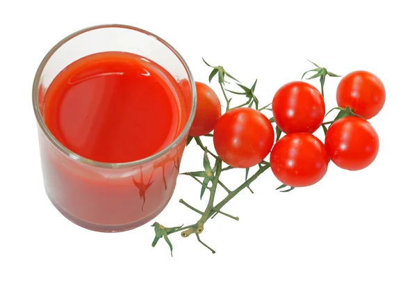Zumo de tomate y tomates cherry Imagen de stock