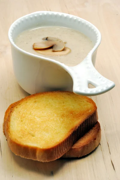 Mushroom soup and toasts — Stock Photo, Image