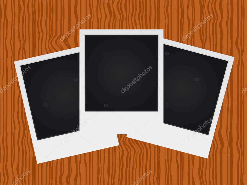 Set of polaroid on wood texture