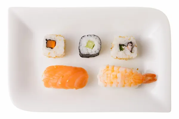 Cinque rotoli di sushi su un piatto — Foto Stock