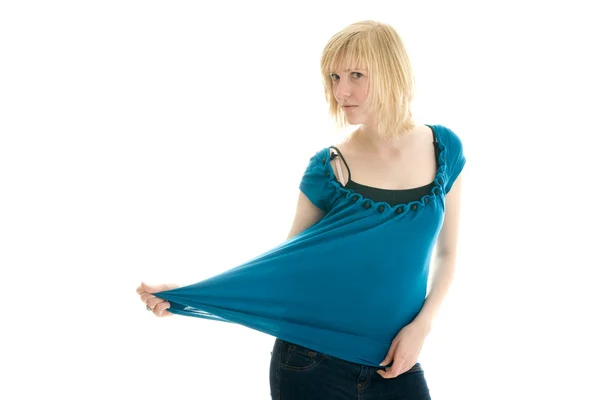 Дівчина-підліток грає з блузкою — стокове фото