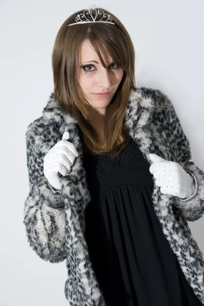 Fashionable teenager girl in fur coat — Stock Photo, Image