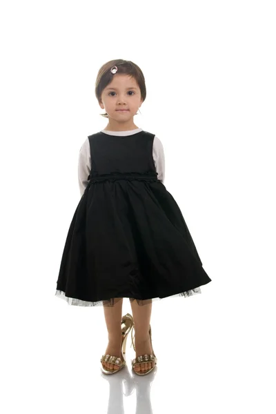 Little girl wearing big high heels — Stock Photo, Image