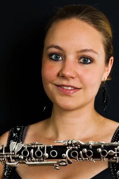 Молодой красивый кларнетист — стоковое фото