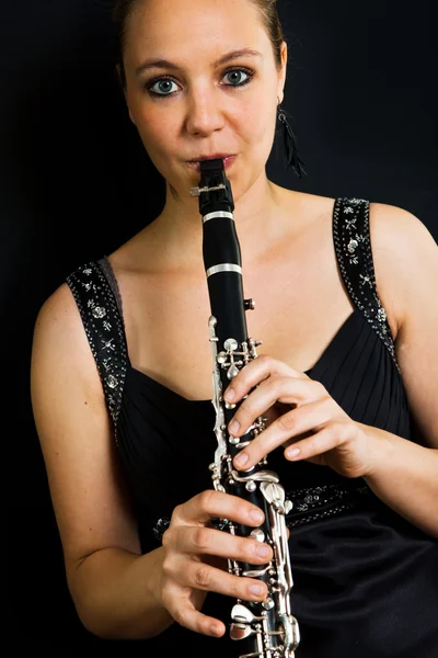 Jovem clarinetista bonita Fotografia De Stock