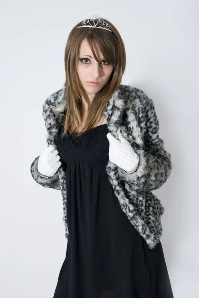 Fashionable teenager girl in fur coat — Stock Photo, Image
