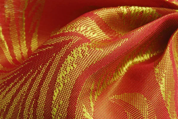 Gouden rode stof textuur — Stockfoto