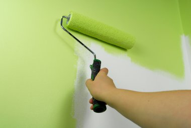 Hand painting wall in green color clipart