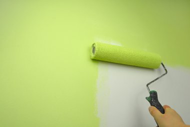 Hand painting wall in green color clipart