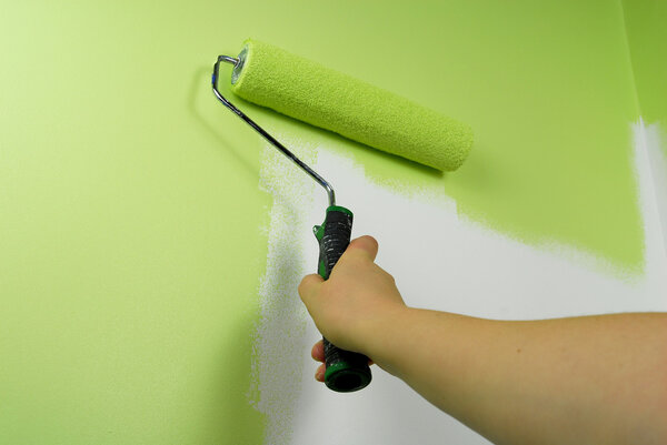 Hand painting wall in green color