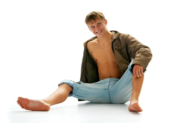 Lad in jeans en jas — Stockfoto