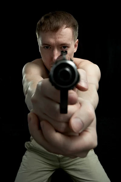 Człowiek z bronią — Zdjęcie stockowe