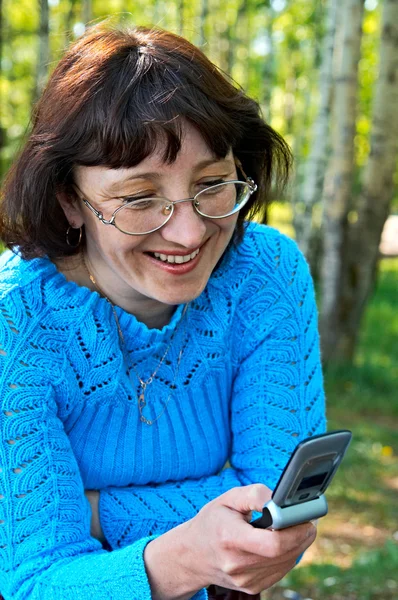 stock image Woman with mobile telephone