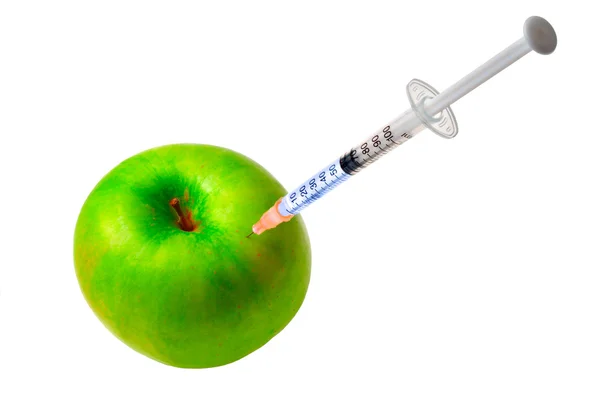 Apple and syringe — Stock Photo, Image