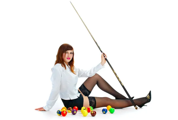 Brunette with cue and billiard ball — Stock Photo, Image