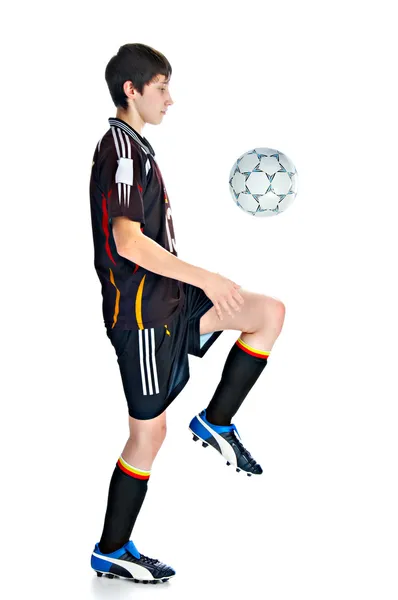 Футболист с мячом — стоковое фото