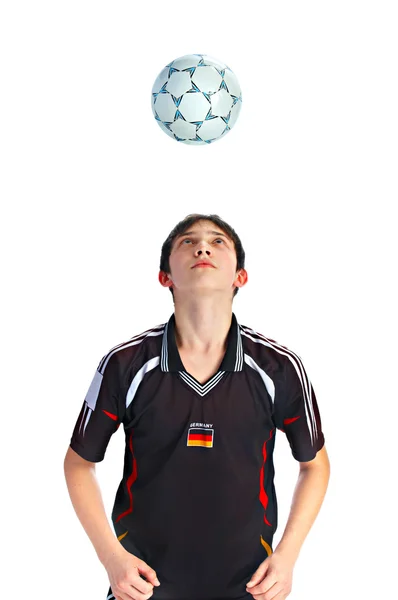 Jogador de futebol jogando bola — Fotografia de Stock