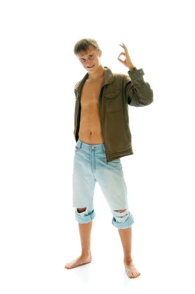 Νεαρός άνδρας στο μπουφάν και τζιν — Φωτογραφία Αρχείου