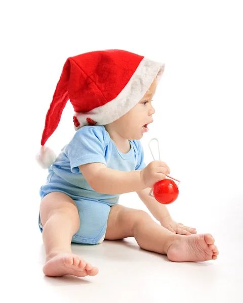 Kleinkind mit Weihnachtsmütze — Stockfoto