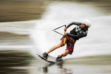 Young man wakeboarding clipart