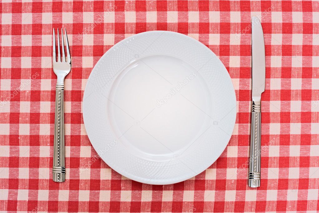 dinner plate with fork and knife