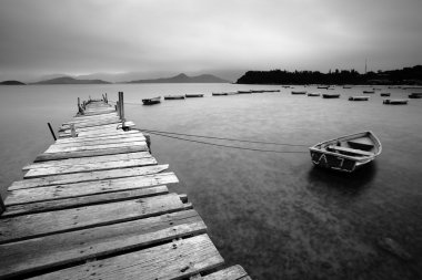 Wooden pier and boats clipart