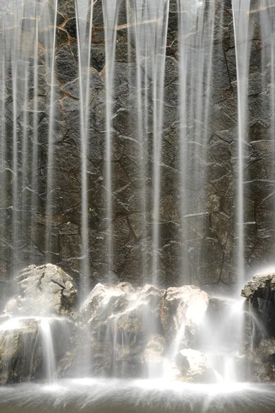Artificial waterfall background — Stock Photo, Image