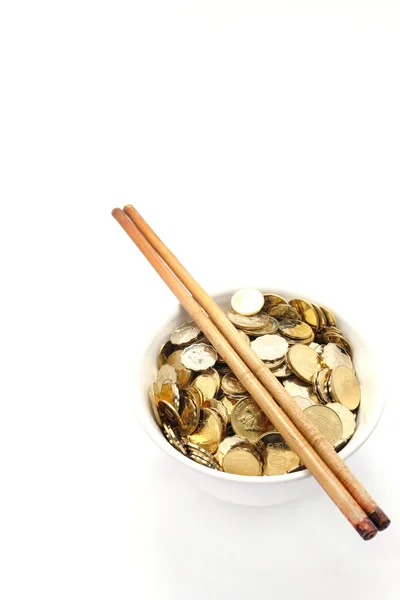 碗的钱用筷子 — 图库照片